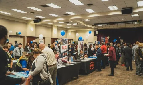 Participants networking at Hiring Spree LA job fair